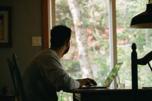 Man working from home using computer
